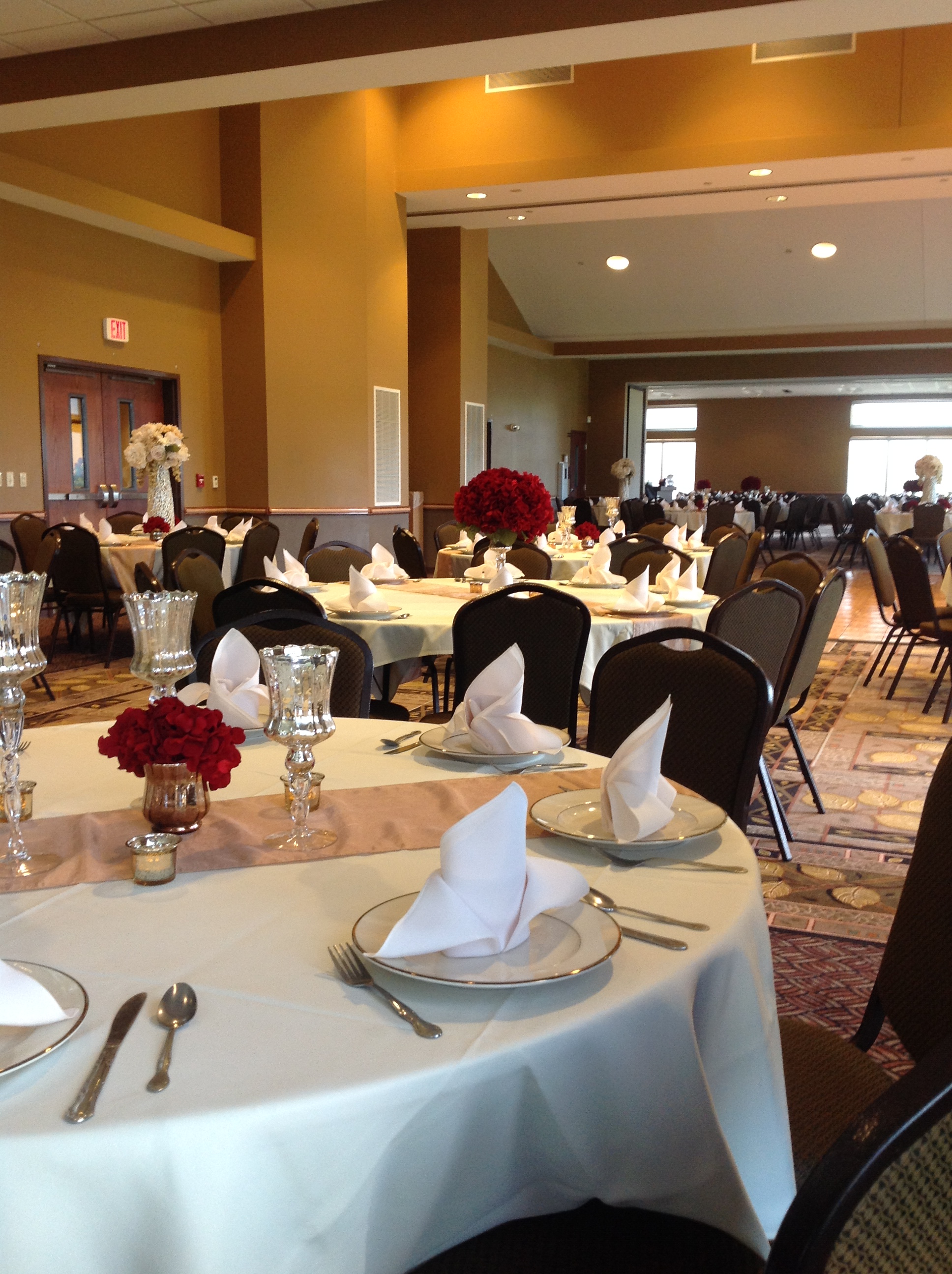 Tables set for a wedding at Boulders Event Center