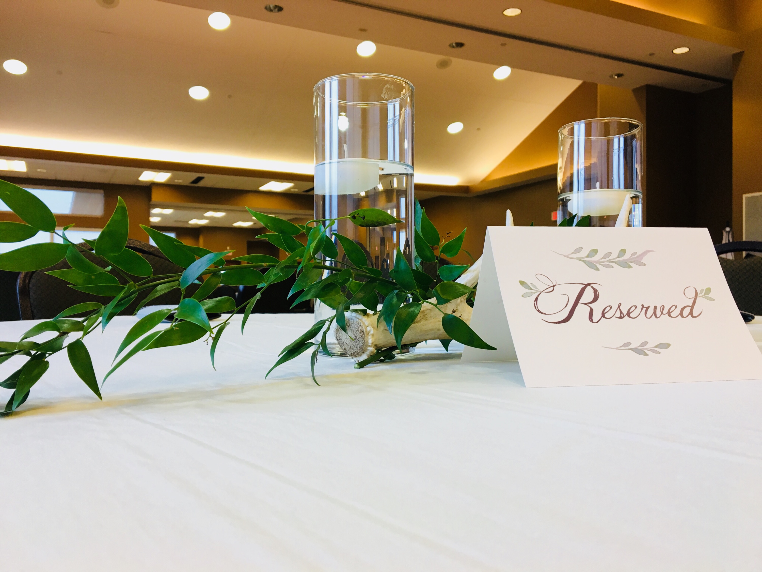 Reserved table sign and centerpiece