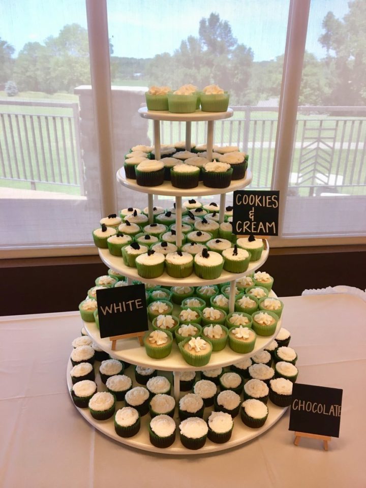 A dessert table with cupcakes at a Boulders Event Center event.